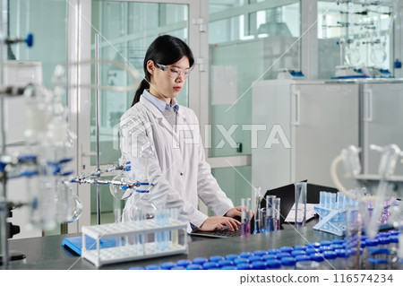 Young Asian female scientist networking 116574234