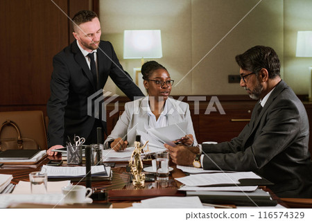 Businesswoman looking at male boss Businesswoman looking at male boss 116574329