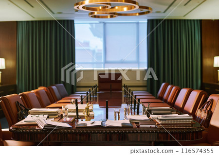 Armchairs surrounding long table Armchairs surrounding long table 116574355