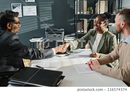 Specialist shaking hand of mature lawyer Specialist shaking hand of mature lawyer 116574374