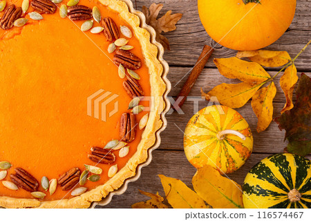 Traditional American autumn dessert . Pumpkin pie . Thankgiving day food 116574467