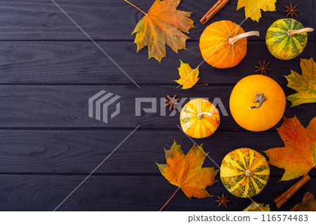 Thanksgiving autumn photo . pumpkin with leaves and spices on rustic wooden background 116574483