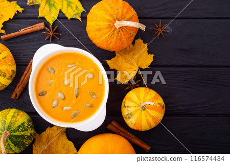 Healthy vegetarian autumn pumpkin soup . Diet food background . 116574484