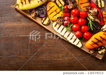 Colorful grilled vegetables on a pan barbecue Colorful grilled vegetables on a pan barbecue 116574513