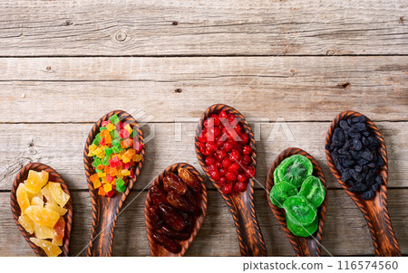 Group of dried and candied fruit in bowl 116574560
