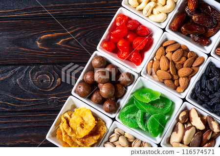 Mix of dried and candied fruits and nuts Mix of dried and candied fruits and nuts 116574571