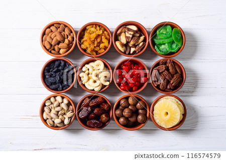 Mix of dried and candied fruits and nuts 116574579