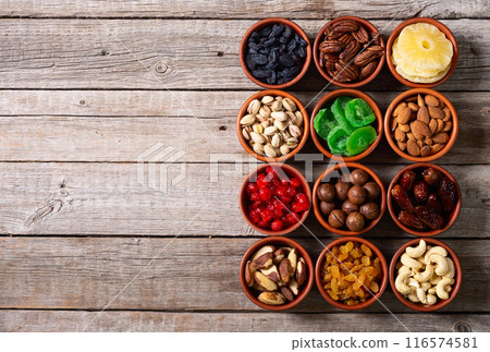 Mix of dried and candied fruits and nuts 116574581