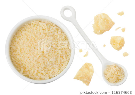grated parmesan cheese in ceramic bowl and spoon isolated on white background. Top view. Flat lay grated parmesan cheese in ceramic bowl and spoon isolated on white background. Top view. Flat lay 116574668
