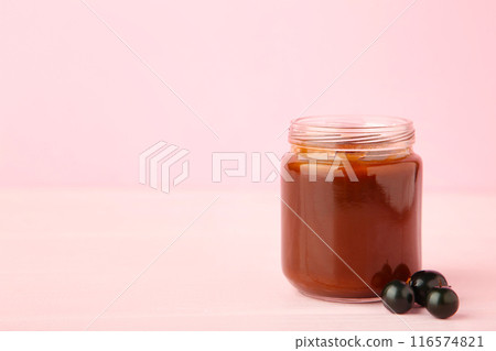 Jars of baby puree on pink background with copy space Jars of baby puree on pink background with copy space 116574821