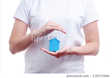 Picture of woman's hands holding a house isolated on white Picture of woman's hands holding a house isolated on white 116575069