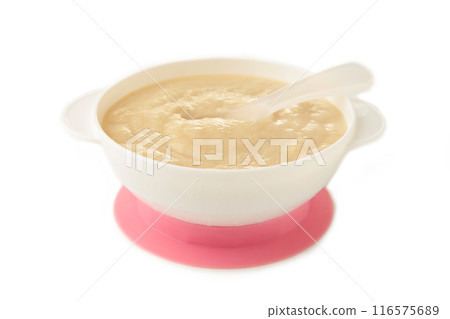 Baby porridge on plate isolated on white background 116575689