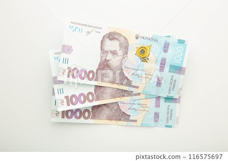 1000 new banknote of Ukraine on white background. Save and money cocncept. Ukrainian Money. 1000 new banknote of Ukraine on white background. Save and money cocncept. Ukrainian Money. 116575697