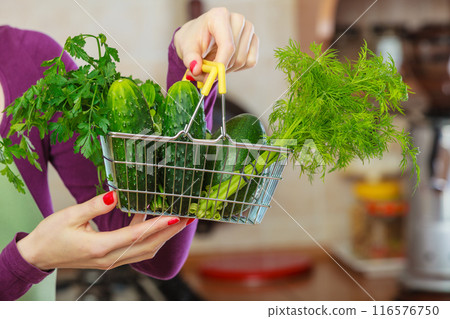 Green vegetables in shopping basket Green vegetables in shopping basket 116576750