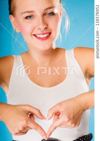 Pin up style, retro girl with heart sign. Pin up style, retro girl with heart sign. 116576952