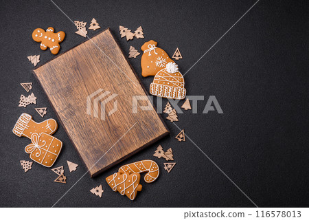 Empty wooden cutting board with Christmas decor elements 116578013
