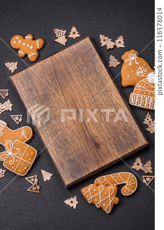Empty wooden cutting board with Christmas decor elements 116578014