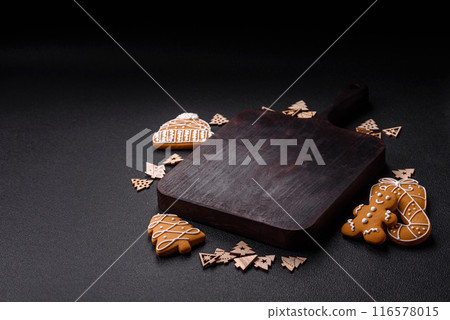 Empty wooden cutting board with Christmas decor elements 116578015