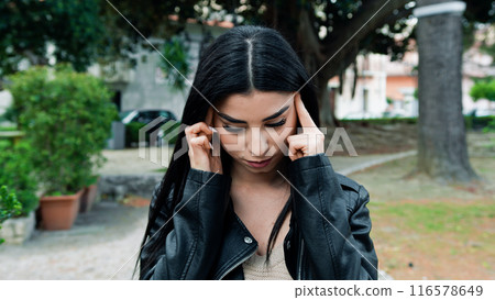 Tired Woman Having An Headache  116578649