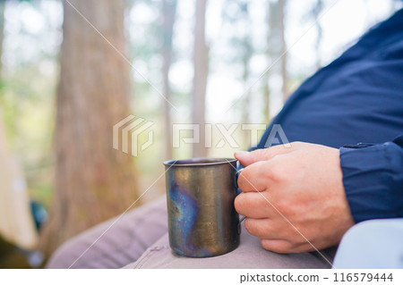 Forest, mug and male hand 116579444