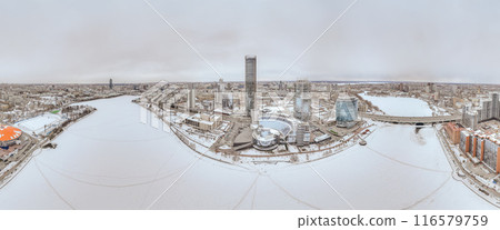 Yekaterinburg city with Buildings of Regional Government and Parliament, Dramatic Theatre, Iset Tower, Yeltsin Center, panoramic view at winter sunset. 116579759