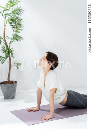 A woman doing yoga 116580238