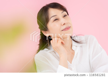 Portrait of a woman in her 50s Portrait of a woman in her 50s 116581281