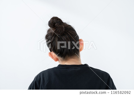 Woman with bun hair, back view 116582092