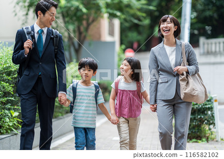 A family going to school together. A family going to school together. 116582102