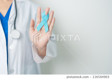 Blue November Prostate Cancer Awareness month, Doctor with Blue Ribbon in hospital for support people life and illness. Healthcare, International men, Father, Diabetes and World cancer day Blue November Prostate Cancer Awareness month, Doctor with Blue Ribbon in hospital for support people life and illness. Healthcare, International men, Father, Diabetes and World cancer day 116584903