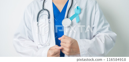 Blue November Prostate Cancer Awareness month, Doctor with Blue Ribbon in hospital for support people life and illness. Healthcare, International men, Father, Diabetes and World cancer day 116584918