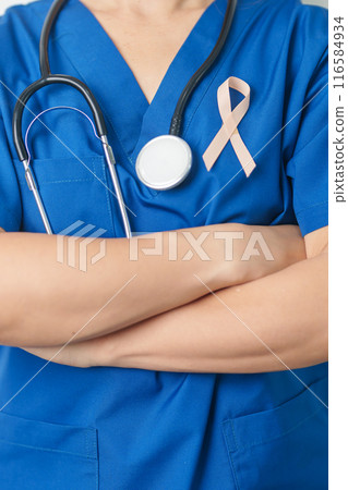 Doctor holding Peach Ribbon for September Uterine Cancer Awareness month. Uterus and Ovaries, Endometriosis, Hysterectomy, Uterine fibroids, Reproductive, Healthcare and World cancer day concept Doctor holding Peach Ribbon for September Uterine Cancer Awareness month. Uterus and Ovaries, Endometriosis, Hysterectomy, Uterine fibroids, Reproductive, Healthcare and World cancer day concept 116584934
