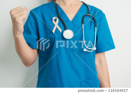 Doctor holding Peach Ribbon for September Uterine Cancer Awareness month. Uterus and Ovaries, Endometriosis, Hysterectomy, Uterine fibroids, Reproductive, Healthcare and World cancer day concept 116584937