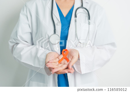 Doctor with Orange Ribbon for Leukemia, Kidney cancer day, world Multiple Sclerosis, CRPS, Self Injury Awareness month. Healthcare and word cancer day concept 116585012