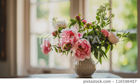 Beautiful bouquet of flowers in a vase. Floral arrangement 116586487