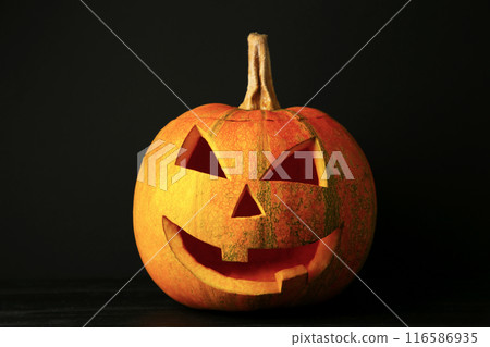 Halloween pumpkin head jack lantern on black background Halloween pumpkin head jack lantern on black background 116586935