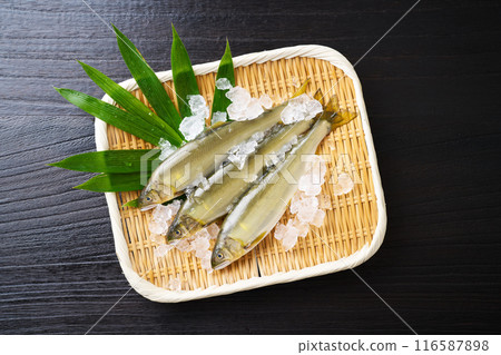 Ayu fish on a bamboo sieve Ayu fish on a bamboo sieve 116587898