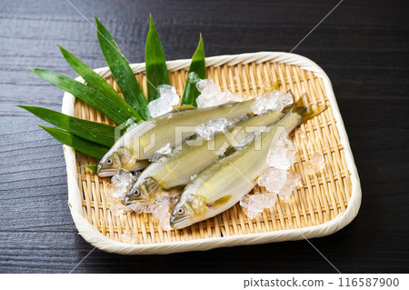 Ayu fish on a bamboo sieve Ayu fish on a bamboo sieve 116587900