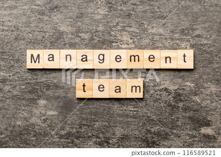 management team word written on wood block. management team text on cement table for your desing, concept management team word written on wood block. management team text on cement table for your desing, concept 116589521