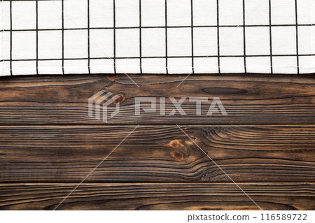 top view with white empty kitchen napkin isolated on table background. Folded cloth for mockup with copy space, Flat lay. Minimal style top view with white empty kitchen napkin isolated on table background. Folded cloth for mockup with copy space, Flat lay. Minimal style 116589722