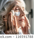 Beautiful gorgeous 50s mid aged mature woman looking at camera isolated on white. Mature old lady close up portrait. Healthy face skin care beauty, middle age skincare cosmetics, cosmetology concept 116591788