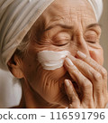 Beautiful gorgeous 50s mid aged mature woman looking at camera isolated on white. Mature old lady close up portrait. Healthy face skin care beauty, middle age skincare cosmetics, cosmetology concept 116591796