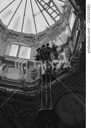 A building with a dome roof in black and white shows symmetry and beauty A building with a dome roof in black and white shows symmetry and beauty 116591891