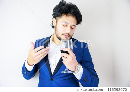 Man smelling wine Man smelling wine 116592070