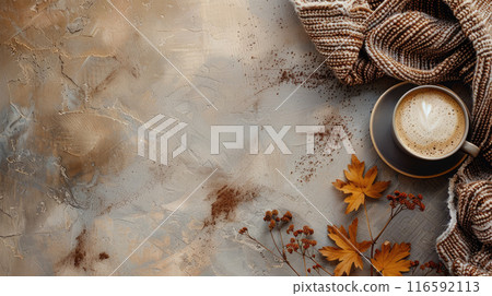 Cozy coffee background with cup of coffee, warm plaid and autumn maple leaves. Flat lay, top view, copy space Cozy coffee background with cup of coffee, warm plaid and autumn maple leaves. Flat lay, top view, copy space 116592113