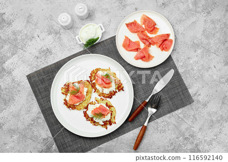 Top view of potato pancake with salmon 116592140