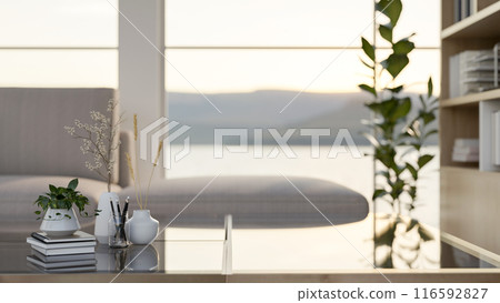A space for displaying products on a modern coffee table in a contemporary bright living room. A space for displaying products on a modern coffee table in a contemporary bright living room. 116592827