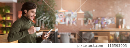 Prosperous young businessman having coffee break at cafe, using smartphone, panorama with copy space Prosperous young businessman having coffee break at cafe, using smartphone, panorama with copy space 116593903