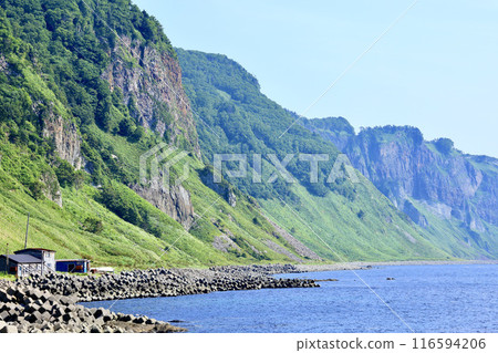 Near Kannon Rock on the Shiretoko Peninsula as seen from Kuzurehama in Rausu, Shiretoko Near Kannon Rock on the Shiretoko Peninsula as seen from Kuzurehama in Rausu, Shiretoko 116594206