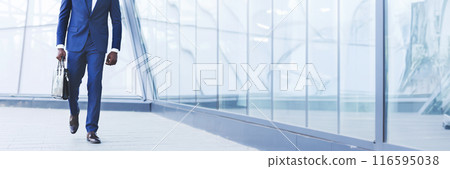 Successful Business Manager. Unrecognizable African American Guy Holding Briefcase Walking Against Modern Building. Cropped, Panorama With Copy Space 116595038